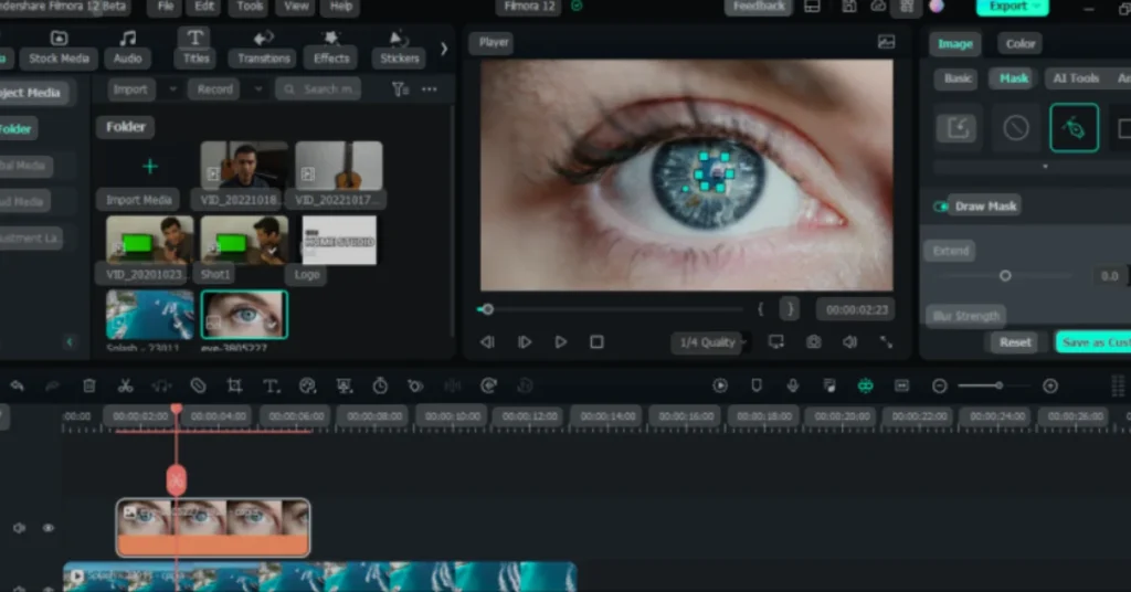 A screenshot of the Filmora 12 video editing interface showing a close-up of an eye with a mask effect applied.